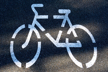 Bicycle drawing on asphalt road.