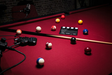 Pool table set with podcast recording equipment
