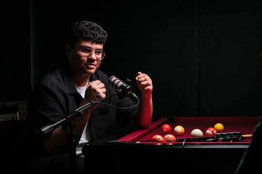 Recording a live podcast session on a billiard table