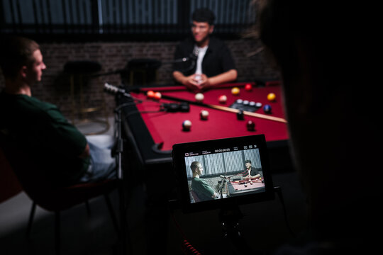 Podcast recording in a studio with live discussion