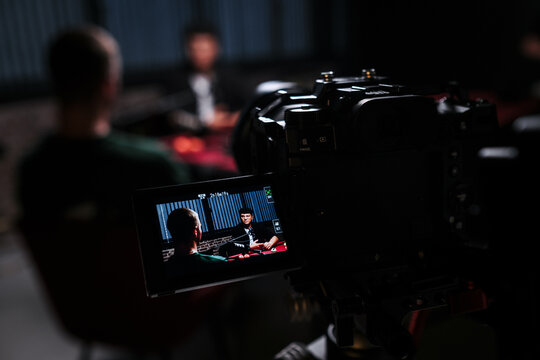 Podcast recording setup with camera and host view