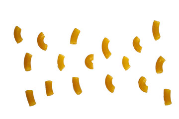 scattered raw elbow macaroni pieces isolated on white background