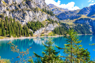 View of Oeschinen lake (Oeschinensee) and Swiss Alps near Kandersteg in Bernese Oberland, Switzerland