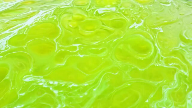 Vibrant lime green liquid dynamics with bubbling patterns in three phases