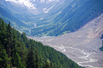 Aerial view of rockfall with gravel and Lonza River at Lötschental Valley in the Swiss Alps...