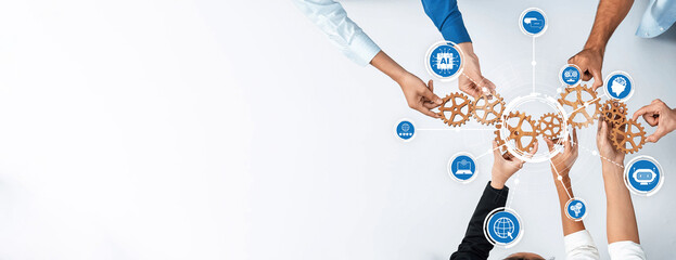 Collaborative effort shown through diverse hands connecting gears, symbolizing innovation and...