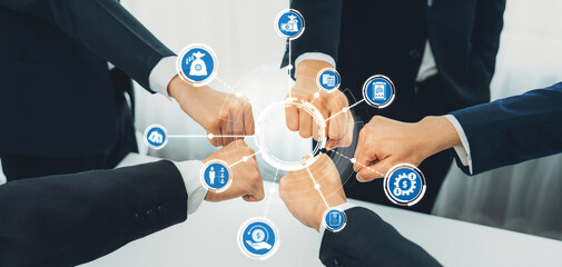 Office worker team stacking hand together symbolize successful group of business partnership and strong collective unity teamwork in community workplace in panoramic banner. Shrewd Amity
