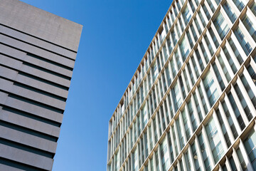 Modern building facade with repetitive architectural elements reaching for the sky