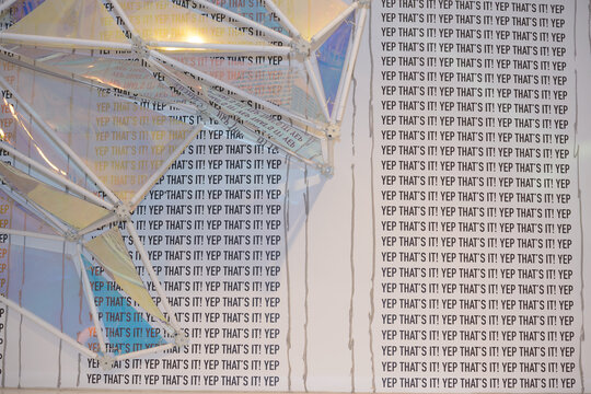 abstract modern retail installation with slogan sign (yep! that's it) inside Hudson's Bay department store, downtown, Toronto
