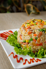 Traditional Chicken Rice Served on Fresh Lettuce Leaves