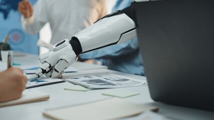 A robotic arm collaborates with a business team in a modern office, showcasing the integration of...