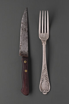 Vintage silverware on gray background