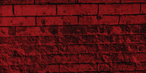 Gritty and tactile wall surface in a compelling red, ideal for conveying rawness, strength, or urban realism with deep shadows.
