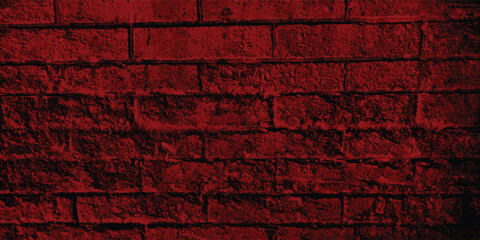 Gritty and tactile wall surface in a compelling red, ideal for conveying rawness, strength, or urban realism with deep shadows.
