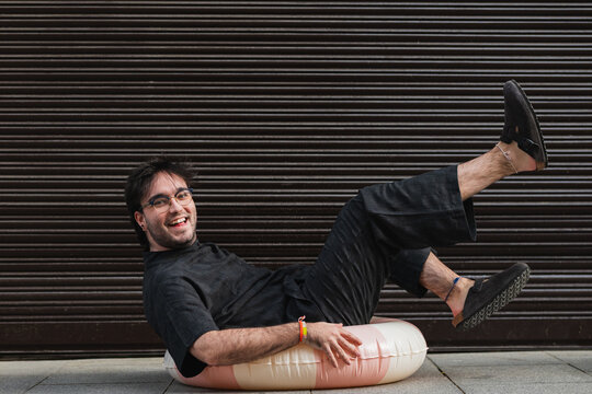 Man in playful summer moments with casual fashion