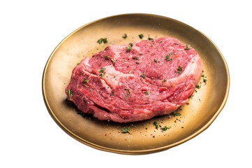 Prime Rib eye steak in a plate, raw dry aged beef meat isolated on white background