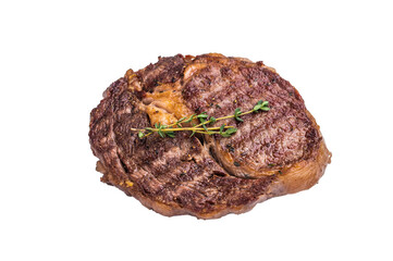 Grilled Rib eye steak with herbs, roast prime beef meat isolated on white background
