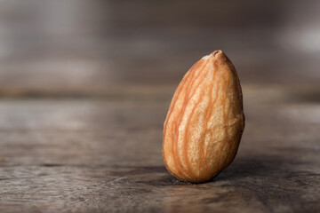 Roasted Almond on wooden table