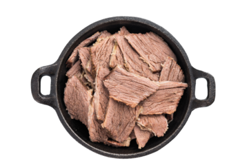 Boiled and sliced beef meat with spices and herbs isolated on white background