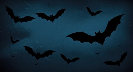 Naklejka premium Silhouettes of bats against a dark blue textured background