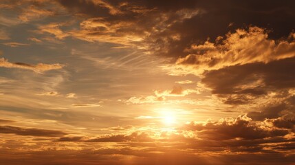 Fototapeta premium Golden Sunset Sky with Dramatic Clouds, Capturing the Beauty of Nature in a Tranquil Evening Scene, Perfect for Landscape Enthusiasts and Travel Content Creators