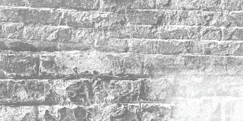 Abstract pattern created by the repetition of blocks or bricks on an old wall, inviting contemplation of form.
