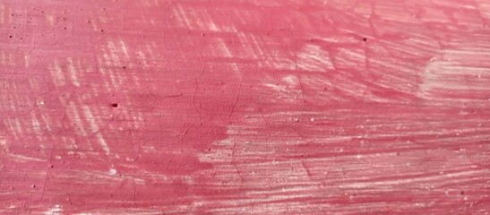 Distressed Pink Painted Concrete Surface with Cracks