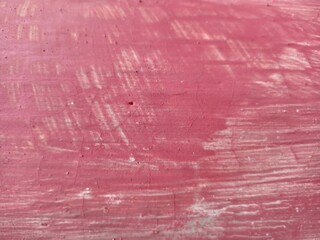 Distressed Pink Painted Concrete Surface with Cracks