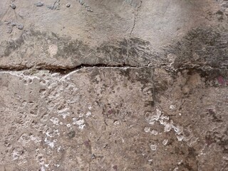 Heavily Cracked and Damaged Concrete Ground Surface
