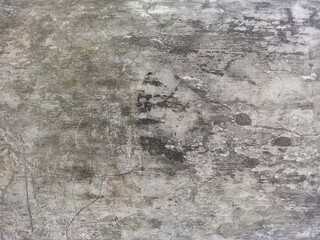 Heavily Distressed Grey Concrete Wall with Cracks