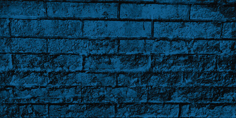 Fototapeta premium Rough and solid texture of a natural stone wall, perfect for creating an authentic, organic, and blue-themed backdrop. 