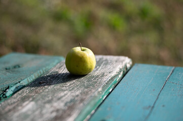 apple on a wooden table