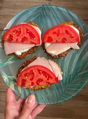 Zucchini and potato pancakes with meat, yogurt and a slice of tomato food, cheese, snack, fresh, plate, salad, meal, tomato, dessert, appetizer
