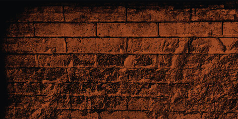 Fototapeta premium Exterior view of an abandoned structure under a warm light, highlighting its unique textures and eerie beauty against a dark background. 