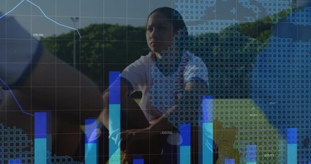 Female soccer player absorbing feedback on field and visualizing data with rising charts map graphs - Powered by Adobe