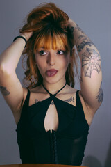 portrait of a young woman pulling a face