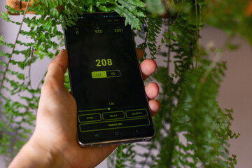 Measuring light levels for plant health in a green space with a smartphone