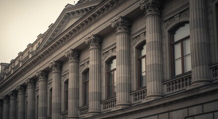 Elegant Facade of Timeless Architecture: A stately building's intricate facade, featuring a rhythmic series of classical columns and window.