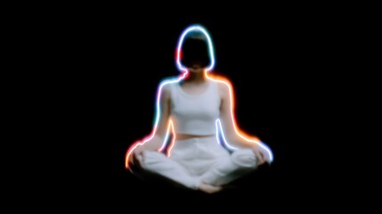 Meditation silhouette with glowing outline in dark background