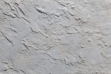 Textured gray stucco wall for modern interior design and construction applications