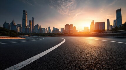 Obraz premium Stunning photo of empty asphalt road with city skyline at sunrise. Winding highway leads to urban buildings. Modern architecture, business district, travel concept.