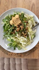 Plate of fresh and healthy food with vegetables, greens and protein. Health, dieting, wellness, and clean eating concept, suitable for nutrition, diet, lifestyle, and culinary-themed purposes.