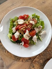 Plate of fresh and healthy food with vegetables, greens and protein. Health, dieting, wellness, and clean eating concept, suitable for nutrition, diet, lifestyle, and culinary-themed purposes.