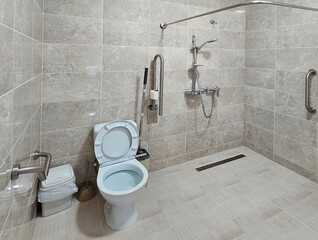 Interior of a bathroom with toilets. Design of sanitary facilities for personal care. Personal hygiene in public places. Ceramic products in everyday life.