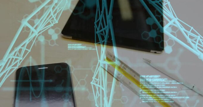 Upon start, holographic wireframe pulsing and scrolling code above desk tools illustrating workflow