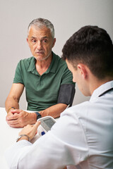 Health Check-Up With a Doctor and Patient in a Medical Office Setting