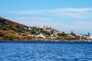 Fototapeta premium A picturesque coastal village on an Italian island overlooking the Mediterranean Sea.