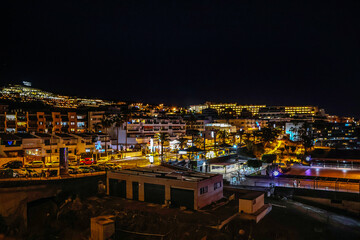Illuminated Puerto Santiago, Los Gigantes, Tenerife, Spain on the Atlantic Ocean at night	
