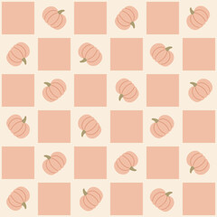 Pumpkin checkered seamless vector pattern with soft orange squares and fall harvest design