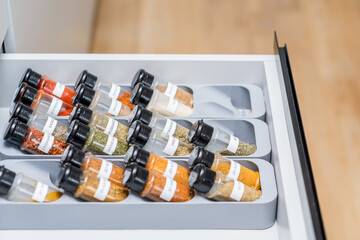 Organized Spice Rack in a Kitchen Drawer